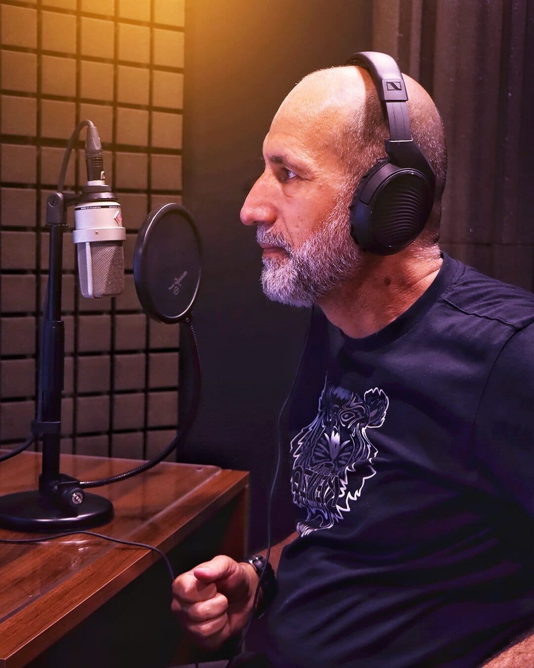 Voice actor Fouad Shamas recording a dub at the microphone